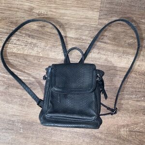 Target suede Backpack purse. Lots of zippered pockets. Great condition